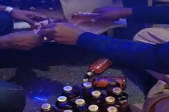Woman Hides Liquor Under Shrine At Home For Illegal Sale, Arrested Woman Hides Liquor Under Shrine At Home For Illegal Sale, Arrested