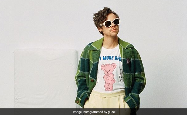 Gucci And Harry Styles Face Backlash For Ad Featuring Child's Bed And Teddy Bear T-Shirt