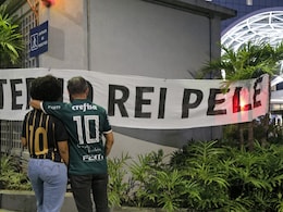 "Our Greatest Idol": Brazilians Flock To Hospital After Pele's Death