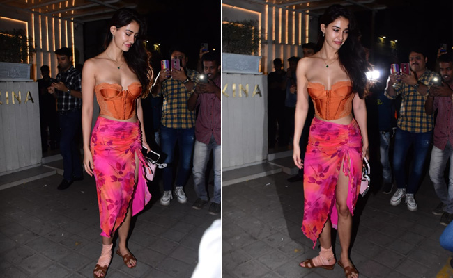 One Look At Disha Patani's Orange Corset Top And Pink Floral Sarong Skirt And You May Think It's Still Summer