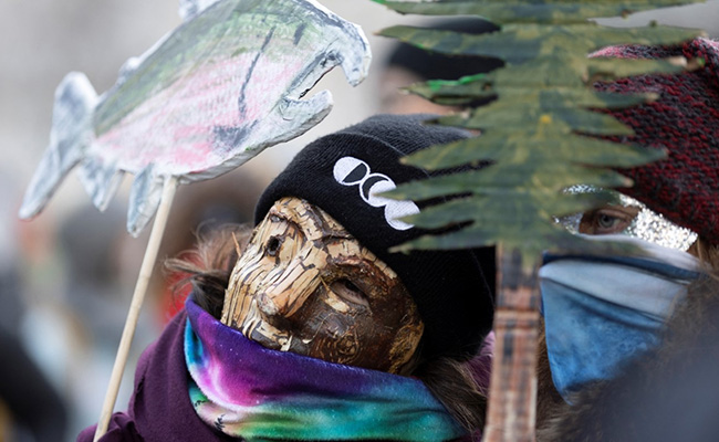 Activists Dress Up As Birds, Trees To Rally At COP15 Climate Summit