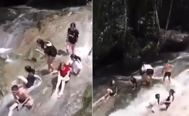 झरने के नीचे बैठे थे लोग तभी आ गई बाढ़, कमजोर दिल वाले न देखें Video