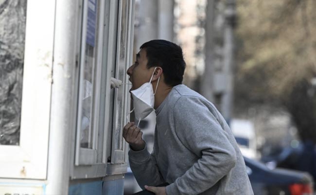 China Megacity's New Work Rule For Covid Patients Marks Big U-Turn