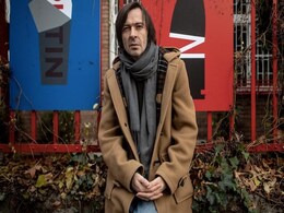 "My Kalashnikov Is My Pen": Ukraine Artist Wages War With Poster "My Kalashnikov Is My Pen": Ukraine Artist Wages War With Poster