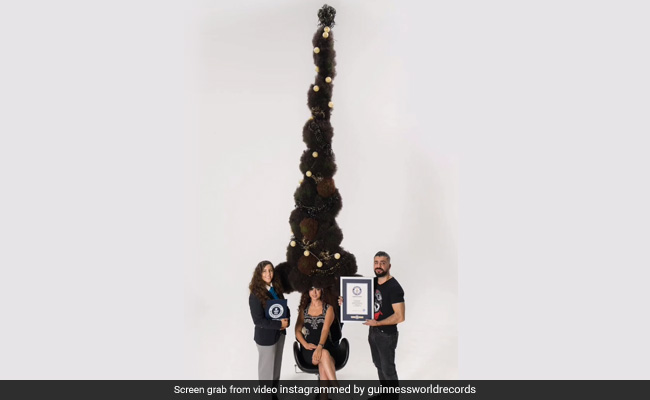 Syrian Hairstylist Makes Guinness World Record For Highest Hairstyle At 2.90 Metres