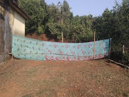 A <i>Saree</i> Serves As A Wall For "Open Toilet" At This School In Karnataka A <i>Saree</i> Serves As A Wall For "Open Toilet" At This School In Karnataka