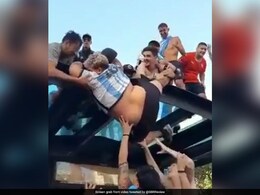 Watch: Wild Argentina Fans Celebrating World Cup Win Lift Heavy Man Atop Bus Stop Watch: Wild Argentina Fans Celebrating World Cup Win Lift Heavy Man Atop Bus Stop
