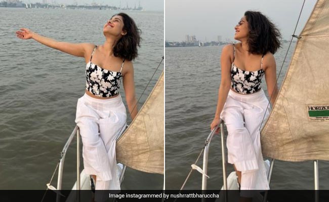 Nushrratt Bharuccha Is "Sailing Into 2023" In Her Chic Floral Top, White Pants