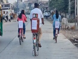 Watch: Gujarat MLA's Cycle Ride To Polling Booth Carrying Gas Cylinder Watch: Gujarat MLA's Cycle Ride To Polling Booth Carrying Gas Cylinder