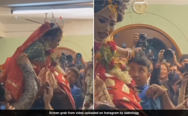 लड़कों ने दुल्हन को गोद में उठाया, गिरने के डर से दुल्हन ने कसकर ऐसे पकड़े लड़के के बाल, कि उखाड़ ही डाले