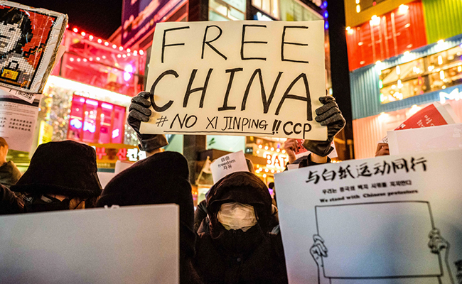 Beijing Drops Covid Negative Report Requirement After Rare Protests