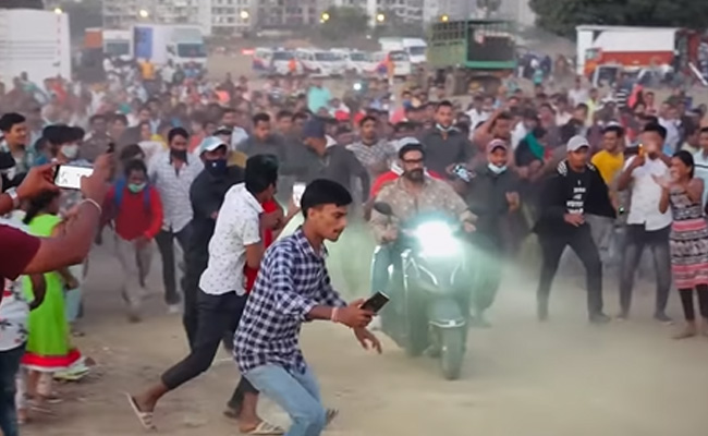 Ajay Devgn's Fans Chase Him As He Rides A Two-Wheeler On <i>Bholaa</i> Sets: "Grateful For Their Love," The Actor Writes