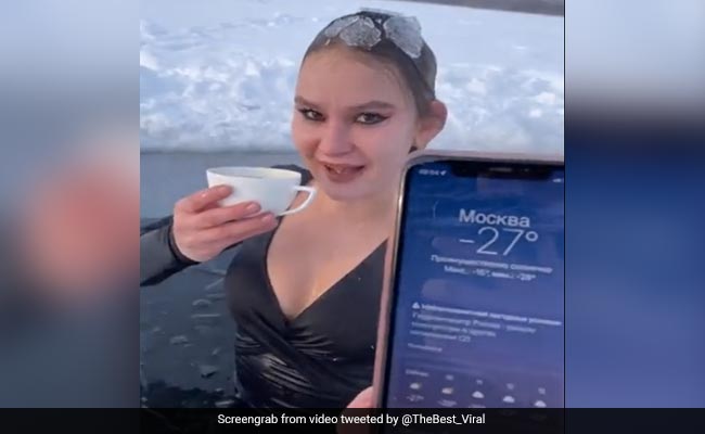 Viral Video Shows Woman Taking A Dip In Freezing Water, Then Drinking Coffee To Fight Cold
