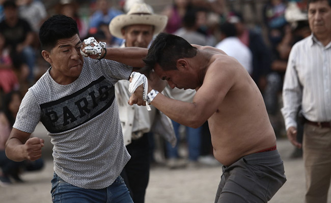 Some Peruvians Get Punches Instead Of Presents On Christmas. This Is Why