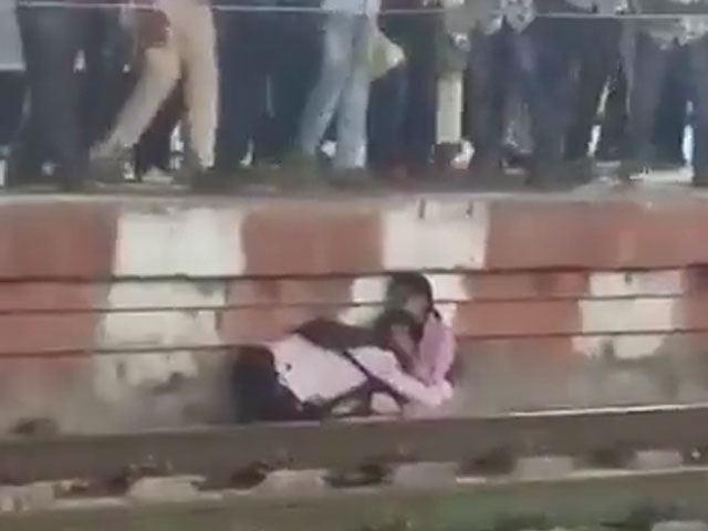 Narrow Escape For Mother-Son At Karnataka Railway Station