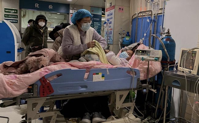 Caring With Covid: Infected Doctors In China Battle Virus Surge