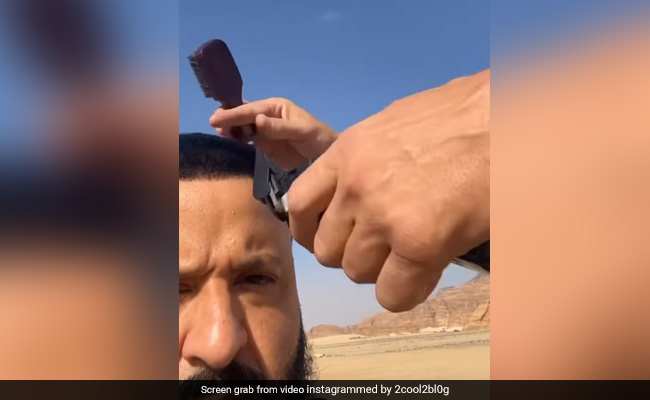 Watch: DJ Khaled Gets Haircut In The Middle Of Saudi Arabian Desert, Shows Off New Look