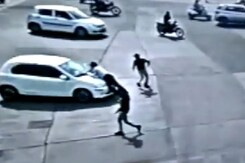 Watch: Traffic Cop Dragged On Top Of Car's Bonnet For 4 km In Indore Watch: Traffic Cop Dragged On Top Of Car's Bonnet For 4 km In Indore