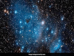 NASA's Hubble Space Telescope Captures Open Star Cluster Glittering In A Nearby Galaxy NASA's Hubble Space Telescope Captures Open Star Cluster Glittering In A Nearby Galaxy