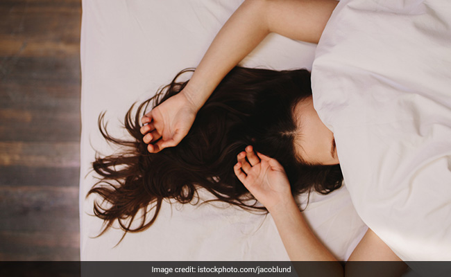 Use dimmer lights or candles instead of bright overhead lights when going to bed