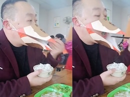 Viral: Man Uses Beak-Shaped Mask To Eat Rice At Restaurant Amid COVID-19 Surge Viral: Man Uses Beak-Shaped Mask To Eat Rice At Restaurant Amid COVID-19 Surge