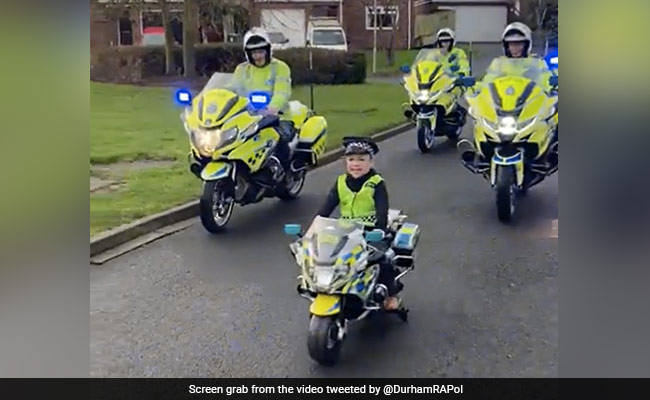 Video: UK Police Let 5-Year-Old Lead The Patrol Team Around A Street On His Toy Bike