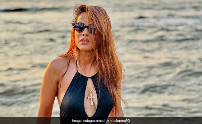 All Days Are Beach Days When Nia Sharma's Cutout Black Swimsuit Comes To Play