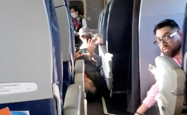 Watch: Flyers Crouch Below Seats, Child Cries As Gunfire Rages Outside