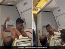 Video Shows Shirtless Man Fighting With Co-Passenger Mid-Air On Biman Bangladesh Flight Video Shows Shirtless Man Fighting With Co-Passenger Mid-Air On Biman Bangladesh Flight