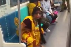 Watch: Woman Scares Metro Passengers By Dressing Up As '<i>Manjulika</i>' In Noida Watch: Woman Scares Metro Passengers By Dressing Up As '<i>Manjulika</i>' In Noida
