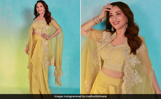 We Can Already Imagine Madhuri Dixit's Pastel Yellow Fusion Set To Be A Spring Wedding Favourite