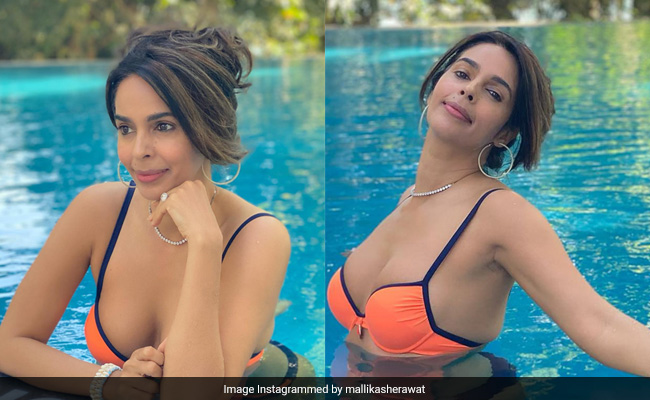 Pool Days Called And They Asked Mallika Sherawat In An Orange Swim Set To Never Leave