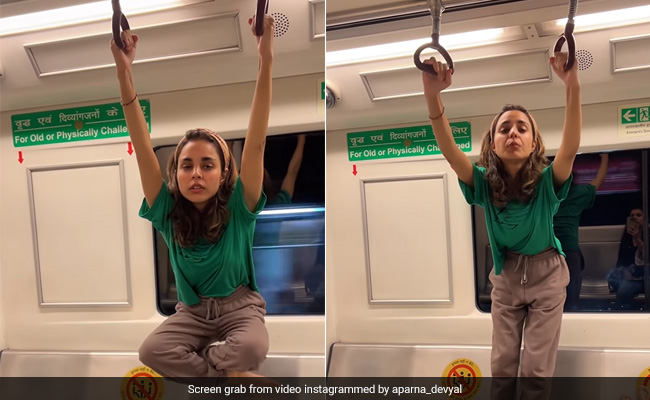 मेट्रो में लटककर झूलती और सीट पर खड़े होकर डांस करती लड़की का Video वायरल, लोग बोले- पापा की परी का नया स्टंट