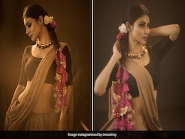 Mouni Roy's Pink Parandi In Her Hair With An Earthy Saree Is Desi Chic Right To The Core Mouni Roy's Pink Parandi In Her Hair With An Earthy Saree Is Desi Chic Right To The Core
