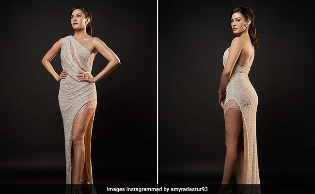 Amyra Dastur's Cutaway Pearly White Embellished Gown With A Slit Is Made For The Red Carpet