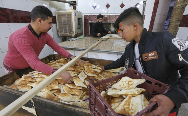 Iraqi Cuisine's Crown Jewel: The Diamond Shaped 'Samoon' Bread