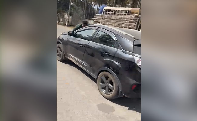 Watch: Bengaluru Woman Drives With Man Lying On Car's Bonnet
