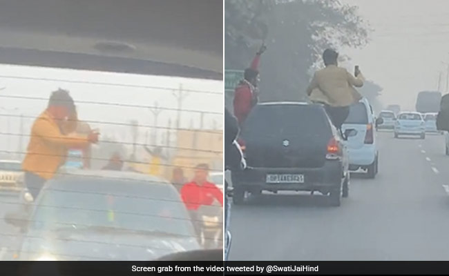 Watch: 3 Men Perform Stunt By Leaning Out Of Moving Car, UP Police To Take Action