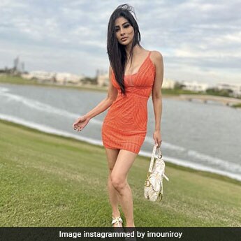 mouni roy orange dress Mouni Roy's Stylish Dubai Holiday Starter Pack Includes This Bright Orange  Dress