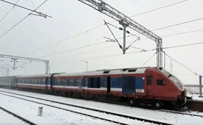 Watch: "Picturesque View" Of Train Passing Through Snow In Kashmir