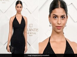 Suhana Khan's Love For Black Dresses Reaches Dubai In A Slinky Halter Version Suhana Khan's Love For Black Dresses Reaches Dubai In A Slinky Halter Version