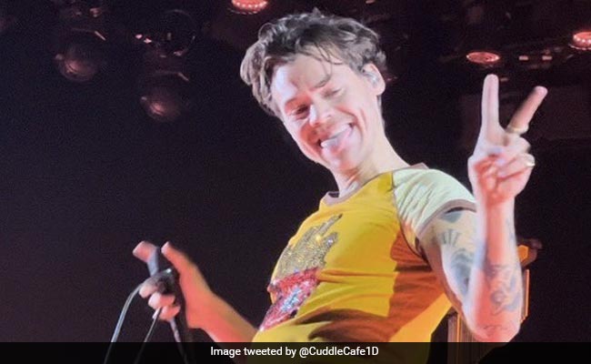 Video: Harry Styles Suffers Wardrobe Malfunction Mid-Concert In Front Of Jennifer Aniston
