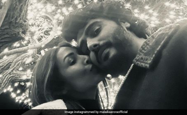 New Year 2023: Malaika Arora And Arjun Kapoor Seal It With A Kiss In Ranthambore - "Love And Light"