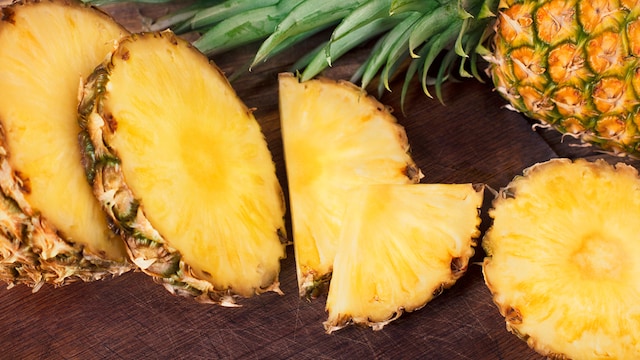The high vitamin C content in pineapples helps produce collagen