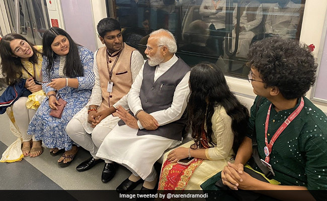 PM Modi Travels In Newly Inaugurated Mumbai Metro Train