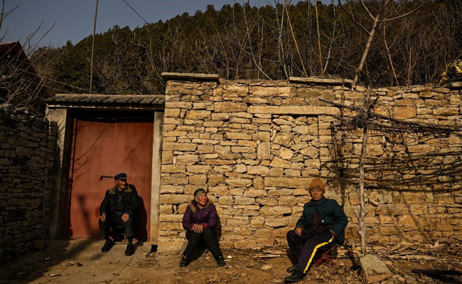 "Total Mess" In China As Covid Wave Decimates Poorest Areas