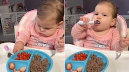 Adorable Baby's Struggle To Eat Fruit With A Spoon Is Just Too Cute To Miss
