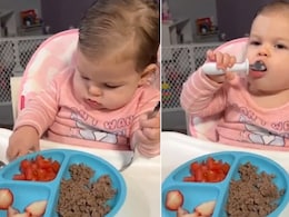 Adorable Baby's Struggle To Eat Fruit With A Spoon Is Just Too Cute To Miss