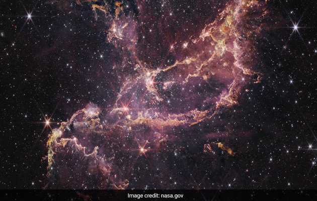 NASA's James Webb Telescope Discovers Star Formation In Dusty Ribbons Of A Cluster