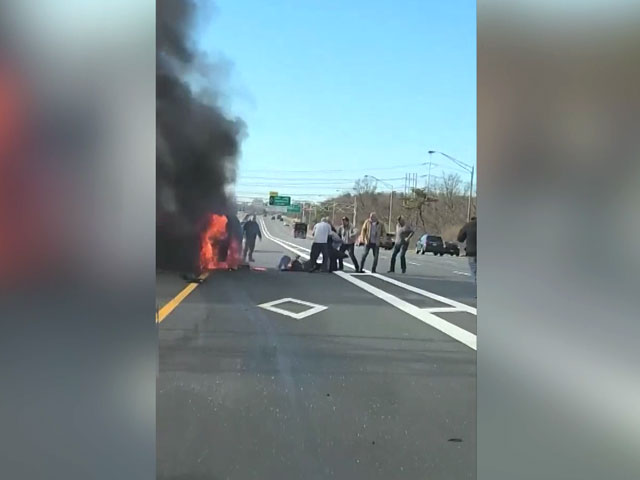 Watch: People Pull Out Woman From Burning Car On New York Highway